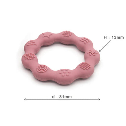 Multi-textured baby silicone teether, ideal for gentle relief of sore infant gums