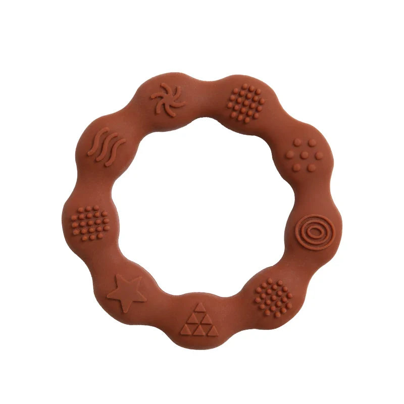 Flexible silicone teether, perfect for baby's small hands & developing fine motor skills