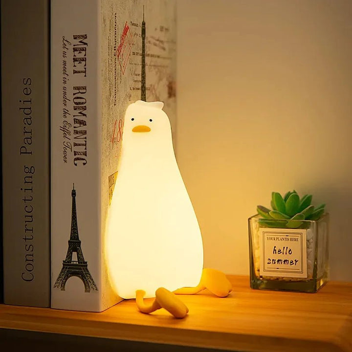Rechargeable animal silicone night light, dimmable for peaceful toddler sleep. Gentle glow.