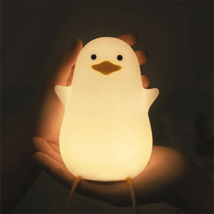 Squishy soft silicone night light, dimmable & safe for kids' soothing bedtime. Nursery essential.