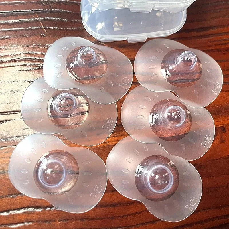 Sanitary 2-pack of silicone breastfeeding nipple shields, offering nursing mothers comfort and support.