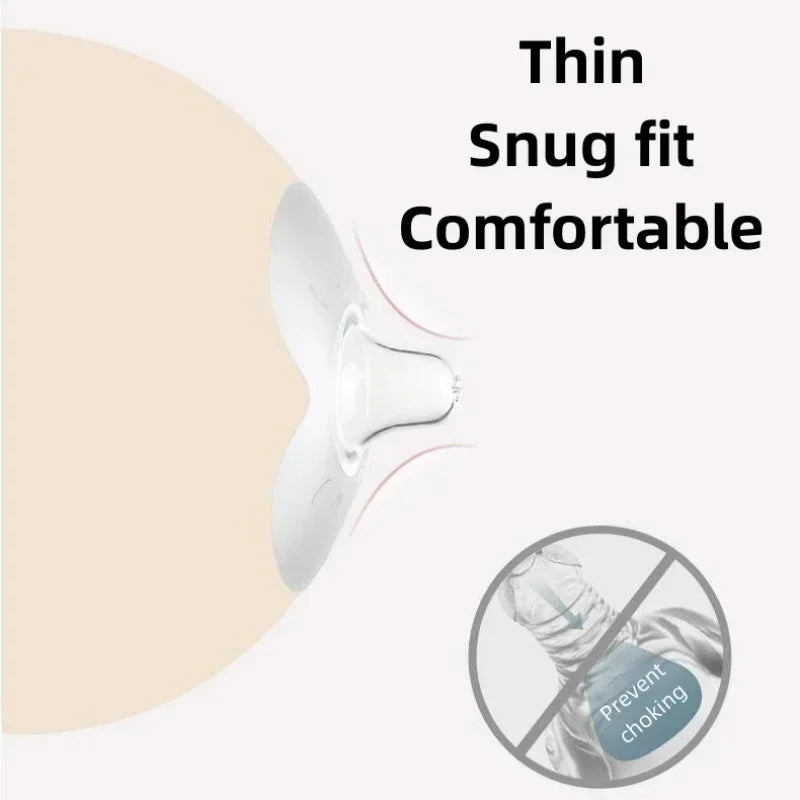 View of two transparent silicone nipple shields on a clean surface, for nursing pain relief.