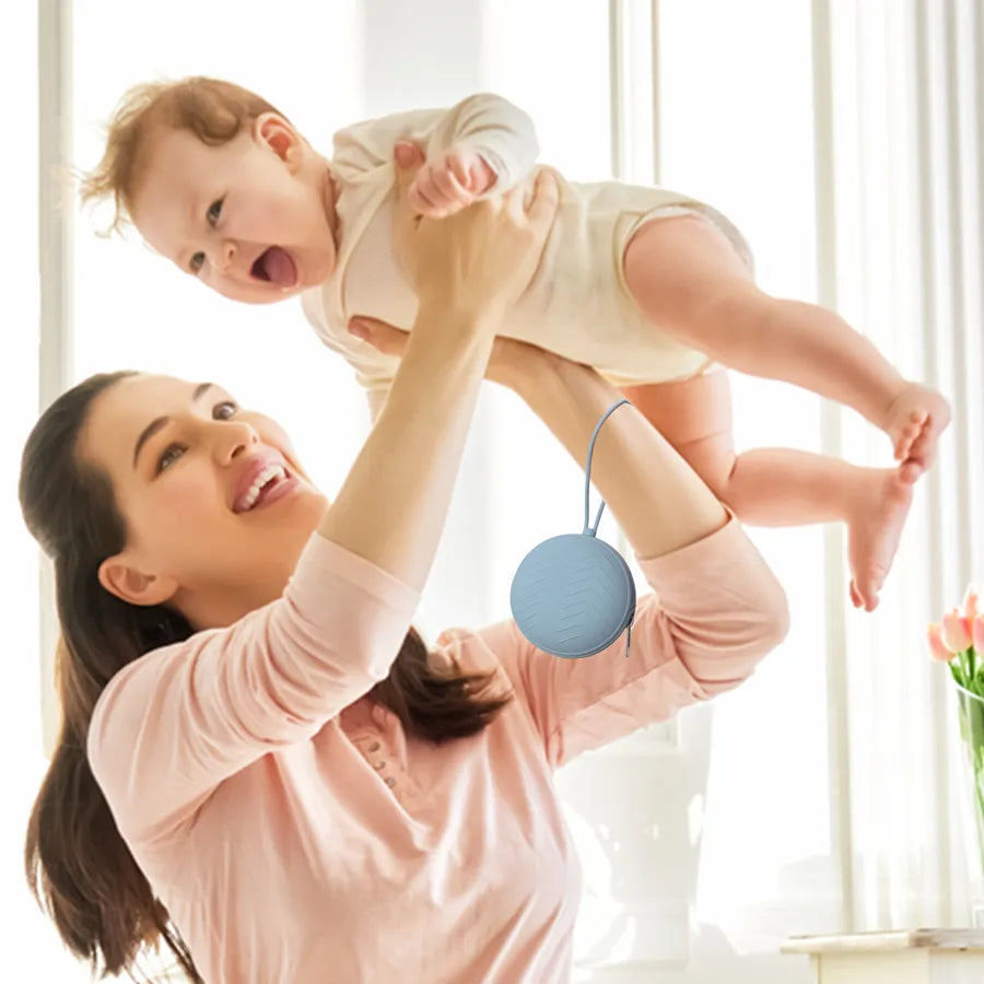 Infant silicone pacifier holder with a secure loop, designed to prevent pacifier loss and maintain hygiene.