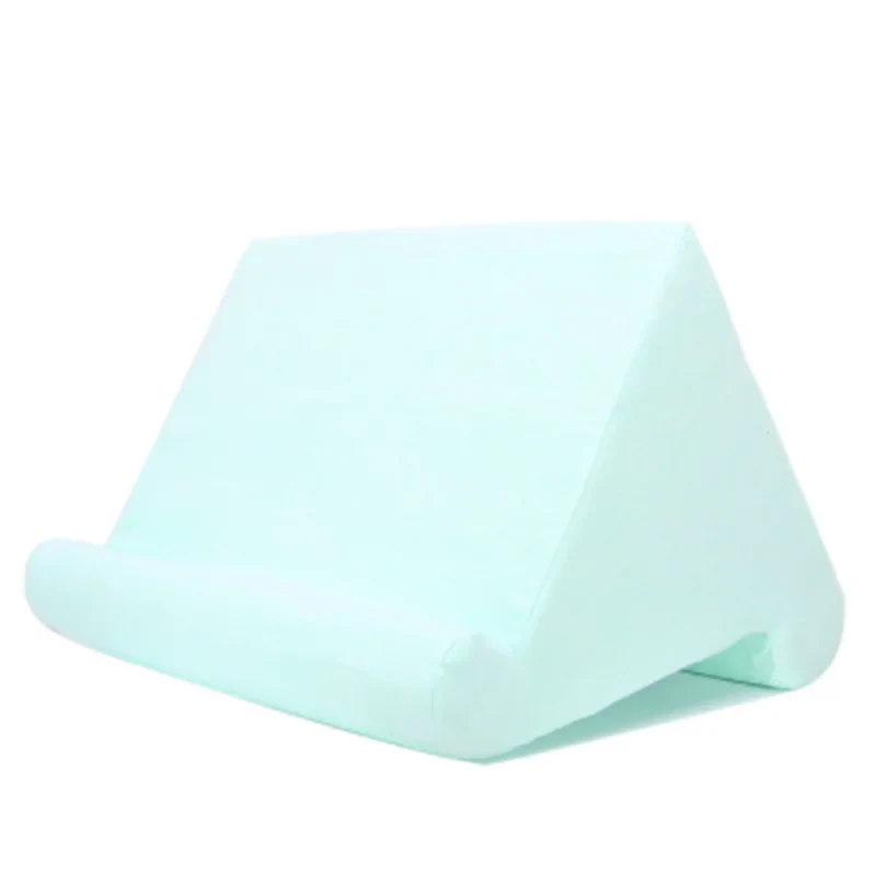 Versatile tablet pillow stand, soft and ergonomic. Hands-free device holder for comfortable viewing and reading.