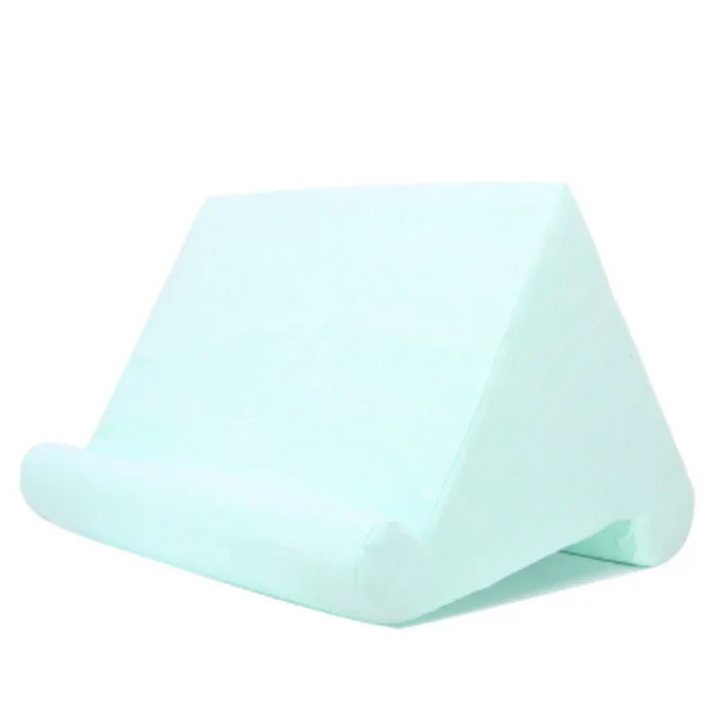 Versatile tablet pillow stand, soft and ergonomic. Hands-free device holder for comfortable viewing and reading.