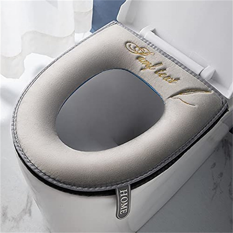 Universal potty seat cover, washable, featuring a durable zipper and handle