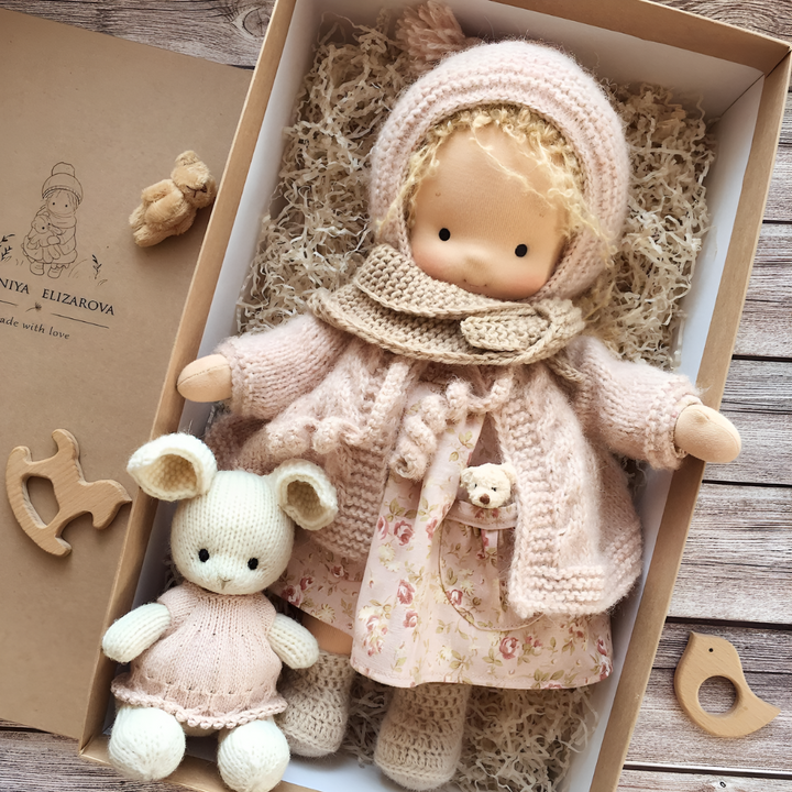 Gentle Waldorf doll, handmade from organic wool for cuddly and imaginative play.