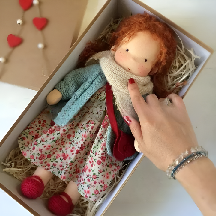 Children's soft Waldorf doll, natural cotton, a beloved handmade toy for imaginative play.