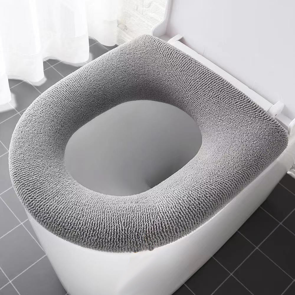 Close-up of plush warm toilet seat cover, washable, enhancing bathroom comfort and hygiene for all