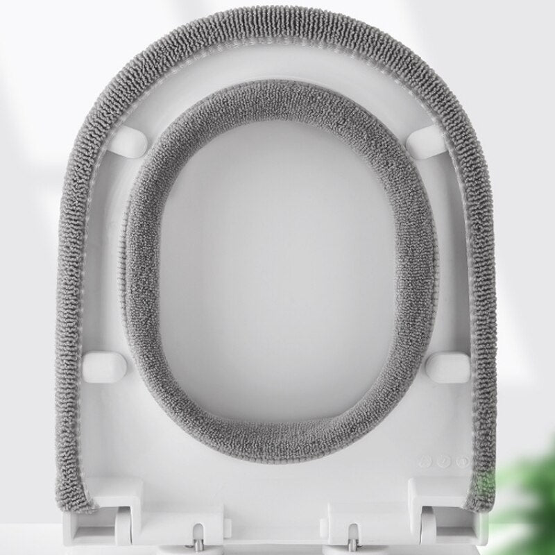 Warm toilet seat cushion in a bathroom, promoting hygiene and comfort, universal design for easy fit