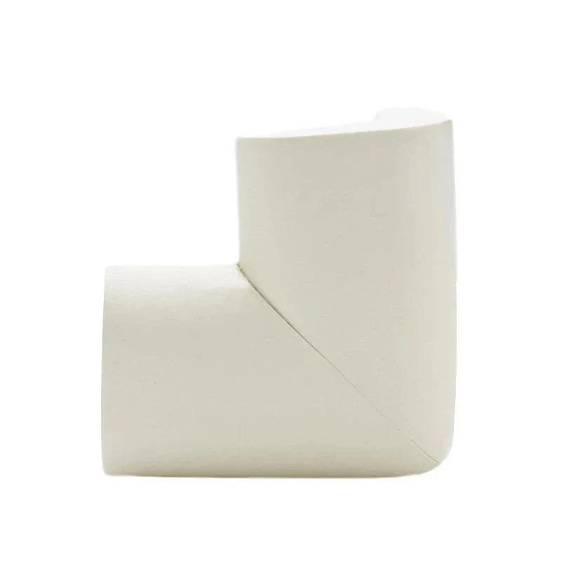 Image showing how to easily apply an edge protector to a furniture corner for quick baby proofing.