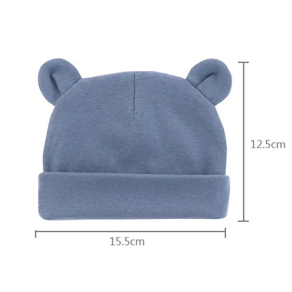 Light grey baby cotton beanie hat, essential baby accessories for infants 0-12 months.