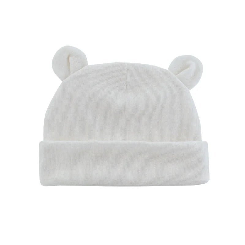 Pink baby cotton beanie hat, cute newborn accessory, perfect for 0-12 month baby gift.