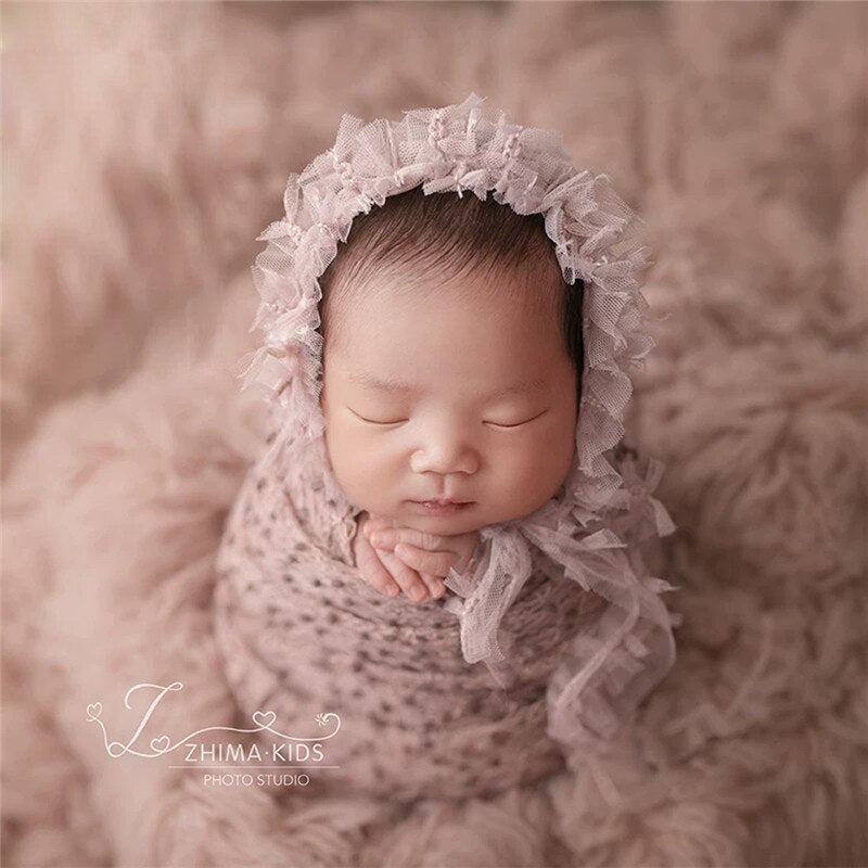 Baby accessories: soft cotton newborn wrap and blanket, perfect for infant photoshoot backdrop.