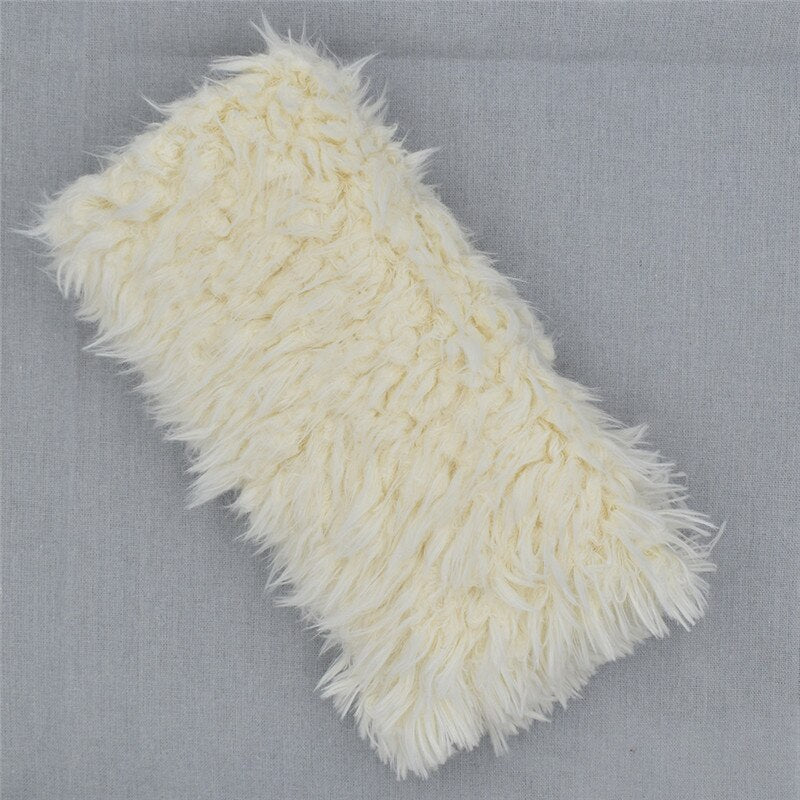 Essential newborn photography prop: a soft faux fur blanket. Perfect for cozy infant photo shoots, baby accessory.