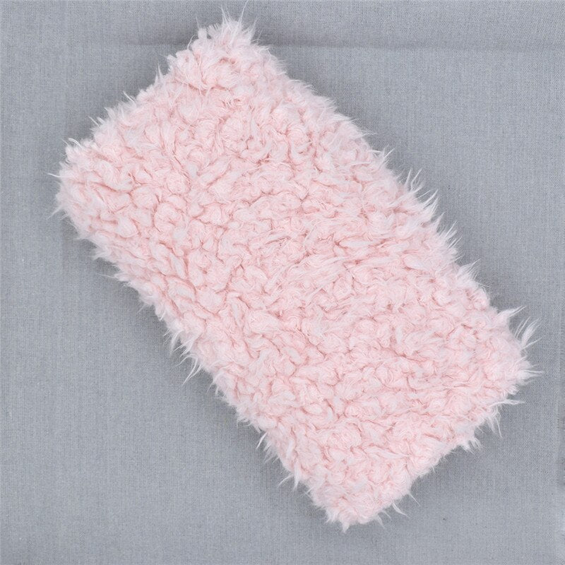 Luxury soft faux fur blanket, an ideal newborn photography prop. Cozy baby accessory for perfect infant photo shoots.