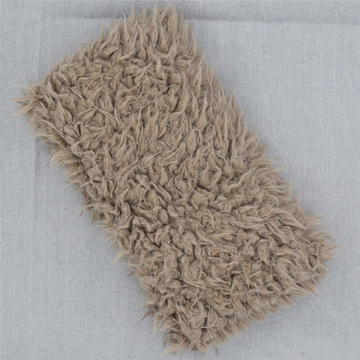 Luxurious faux fur newborn photography prop blanket, soft & cozy for infant photo shoots. Ideal baby accessory.