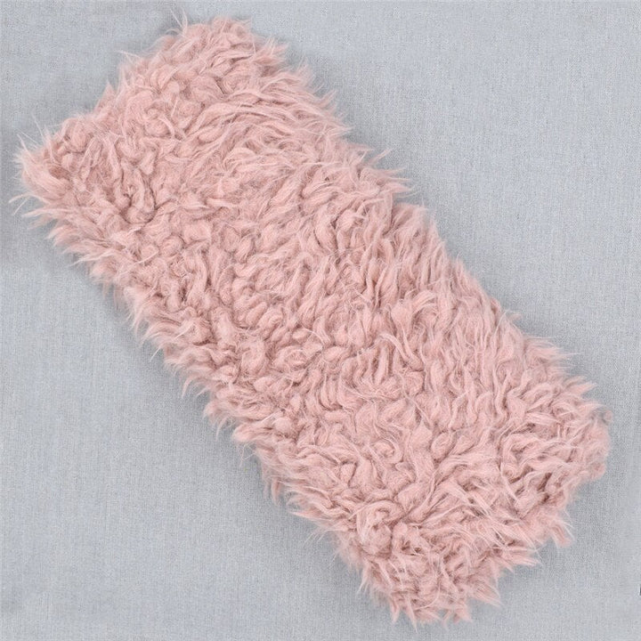 Fluffy faux fur newborn blanket, a super soft photography prop. Keeps baby cozy during photo shoots, infant accessory.