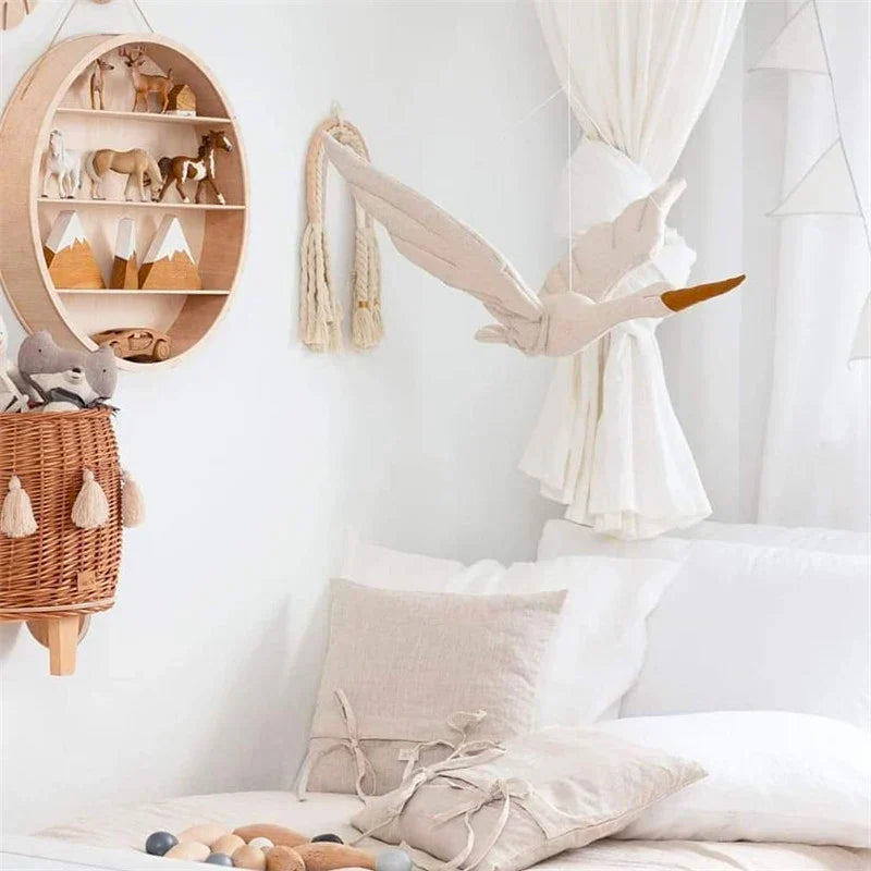 Chic hanging swan ornament, a soft toy and wall decor piece for a modern baby nursery.