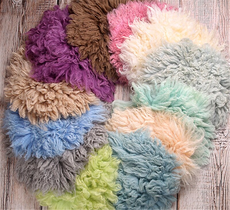 Warm wool infant posing blanket, ideal for creating cozy newborn photo setups.