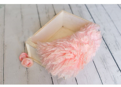 Hand-knitted wool blanket, essential infant photo prop for professional photography.