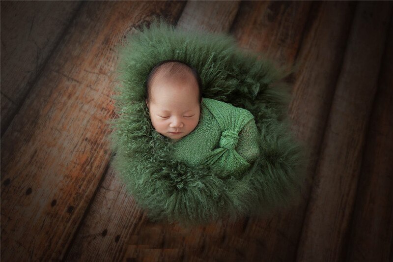 Off-white wool baby blanket, perfect as a photography backdrop or posing prop.