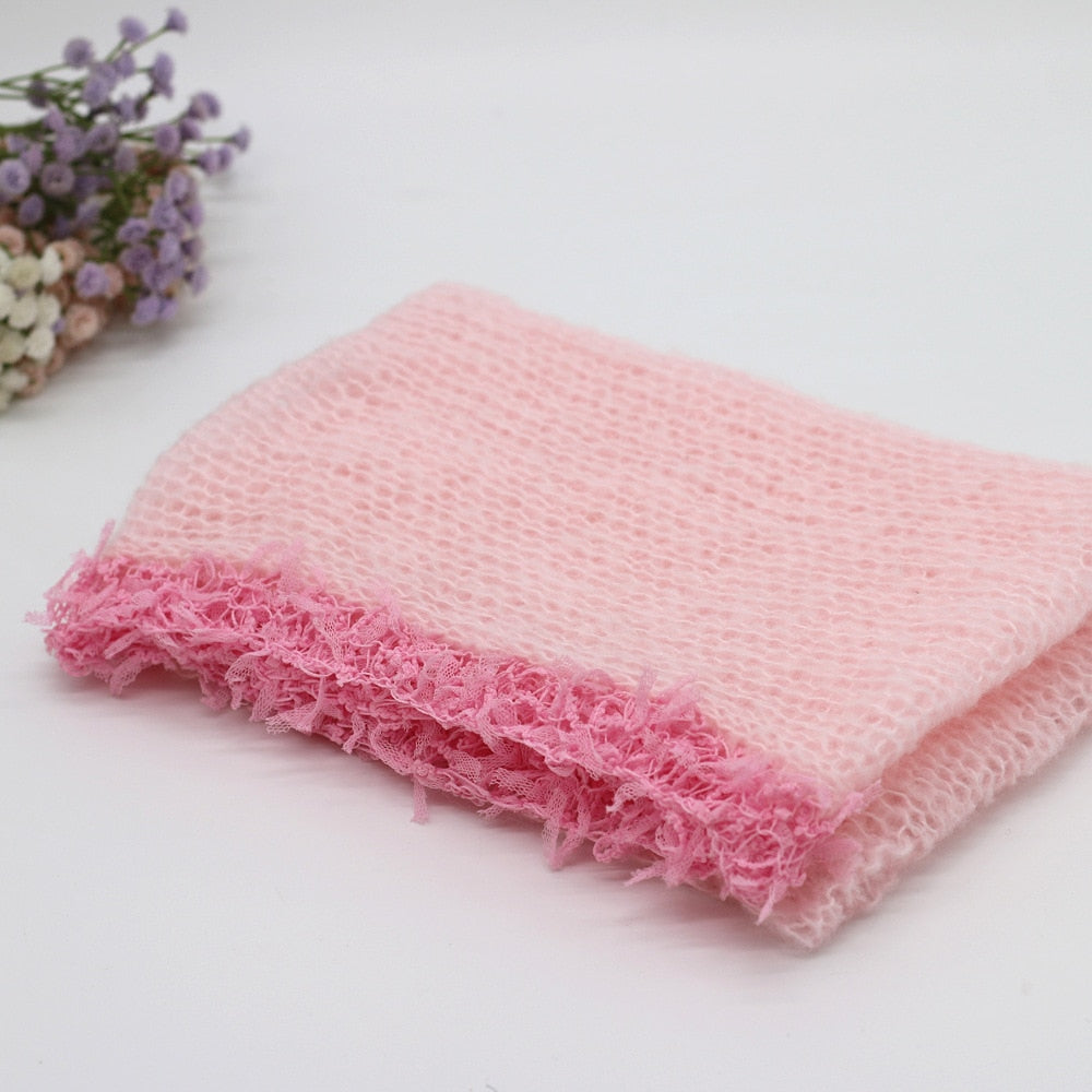 Delicate knit swaddle blanket, versatile infant wrap for baby photography, soft & cozy newborn prop.