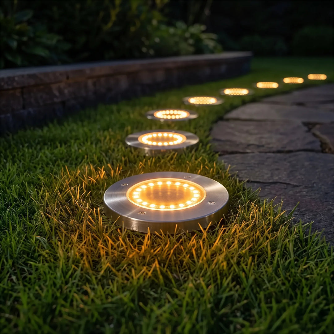 Solar-powered LED ground lights for bright garden walkways.