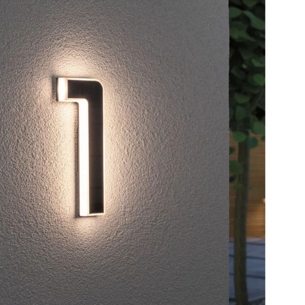 Modern LED address light, weather resistant, perfect for home exterior.