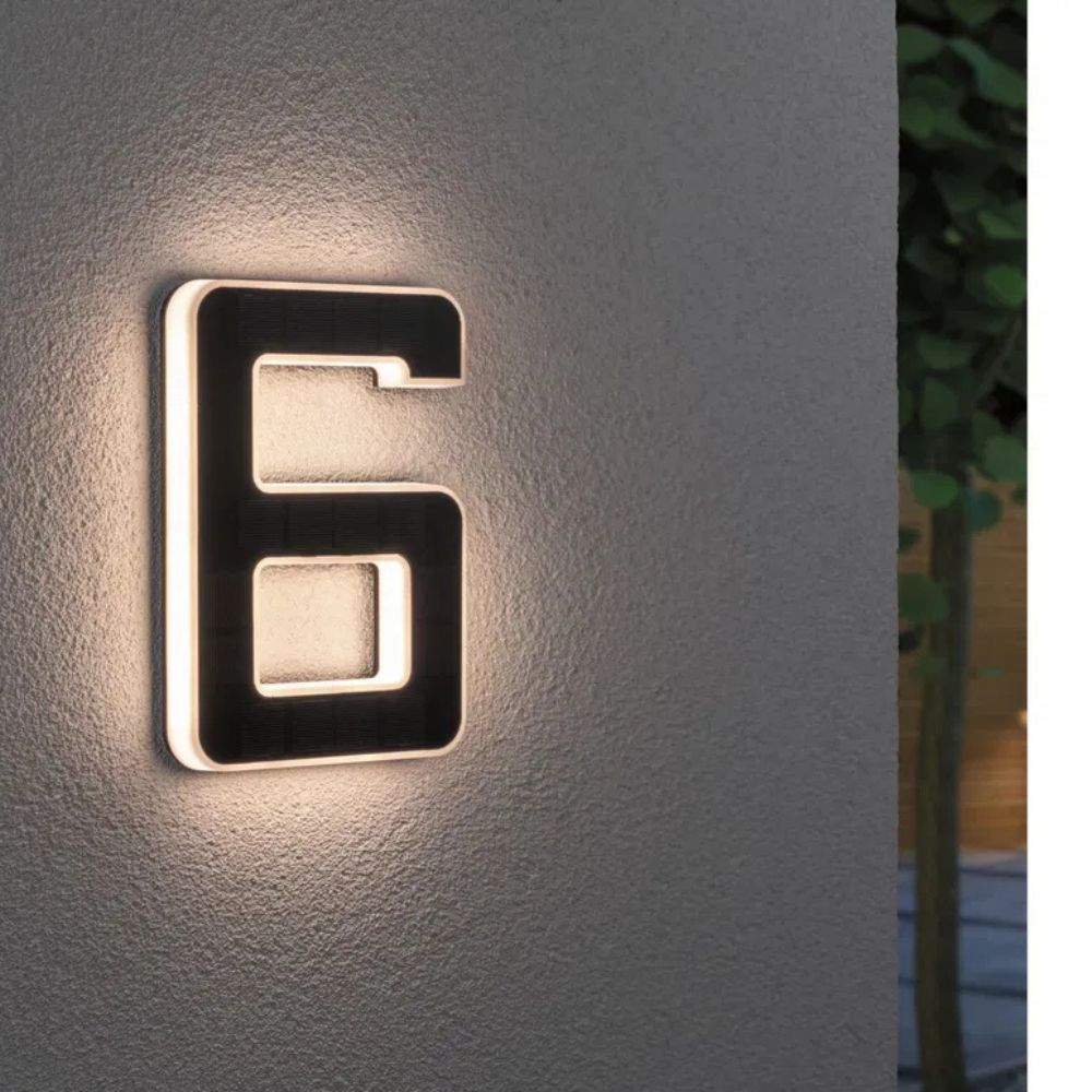 Durable solar illuminated address sign, ideal for outdoor lighting and visibility.