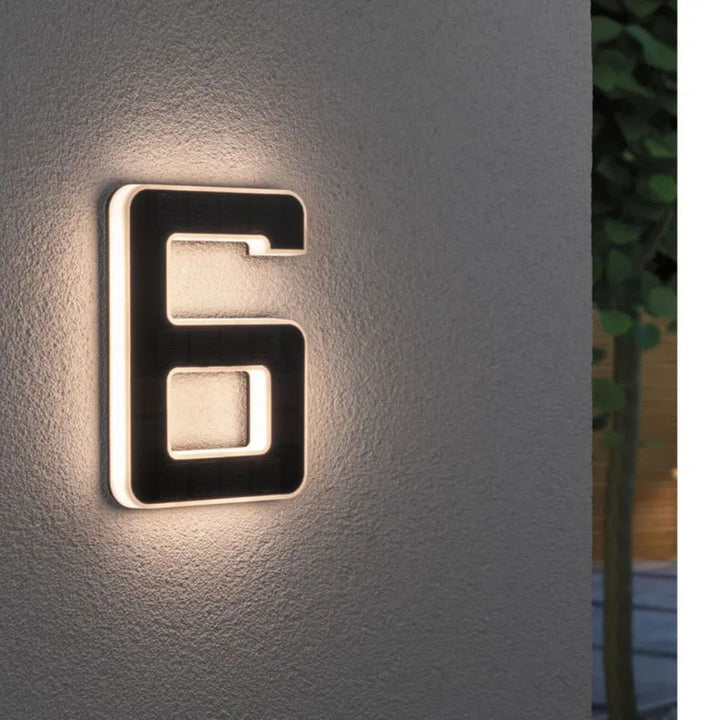 Durable solar illuminated address sign, ideal for outdoor lighting and visibility.