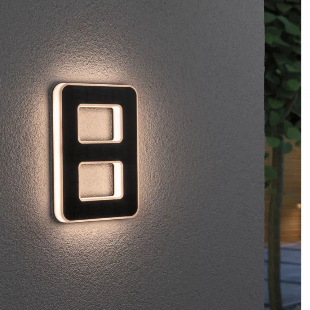 Stylish solar powered house number sign, enhancing home exterior and visibility.