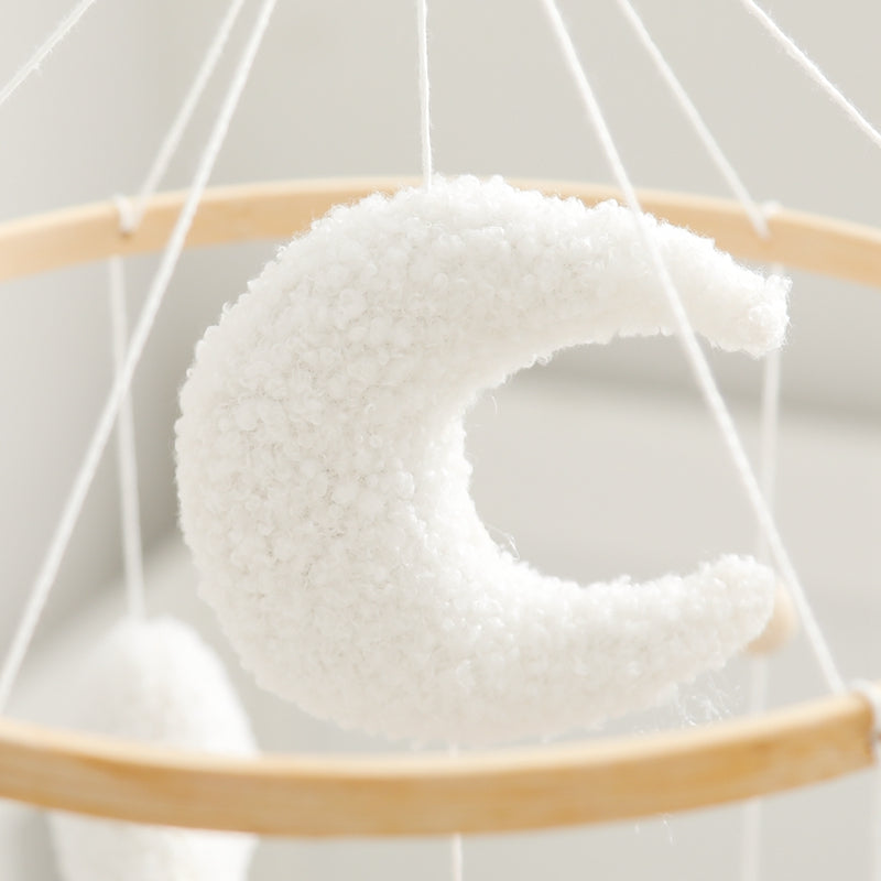 Baby crib mobile with soft bear and star figures, a gentle sensory toy and gift.