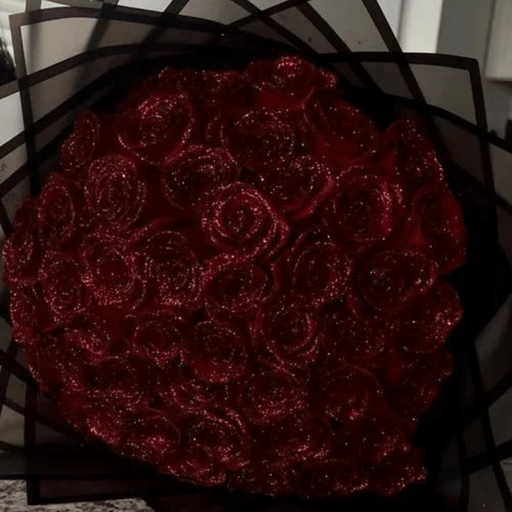 Decorative eternal glitter rose accent, a sparkling unfading flower to brighten home decor or office spaces.