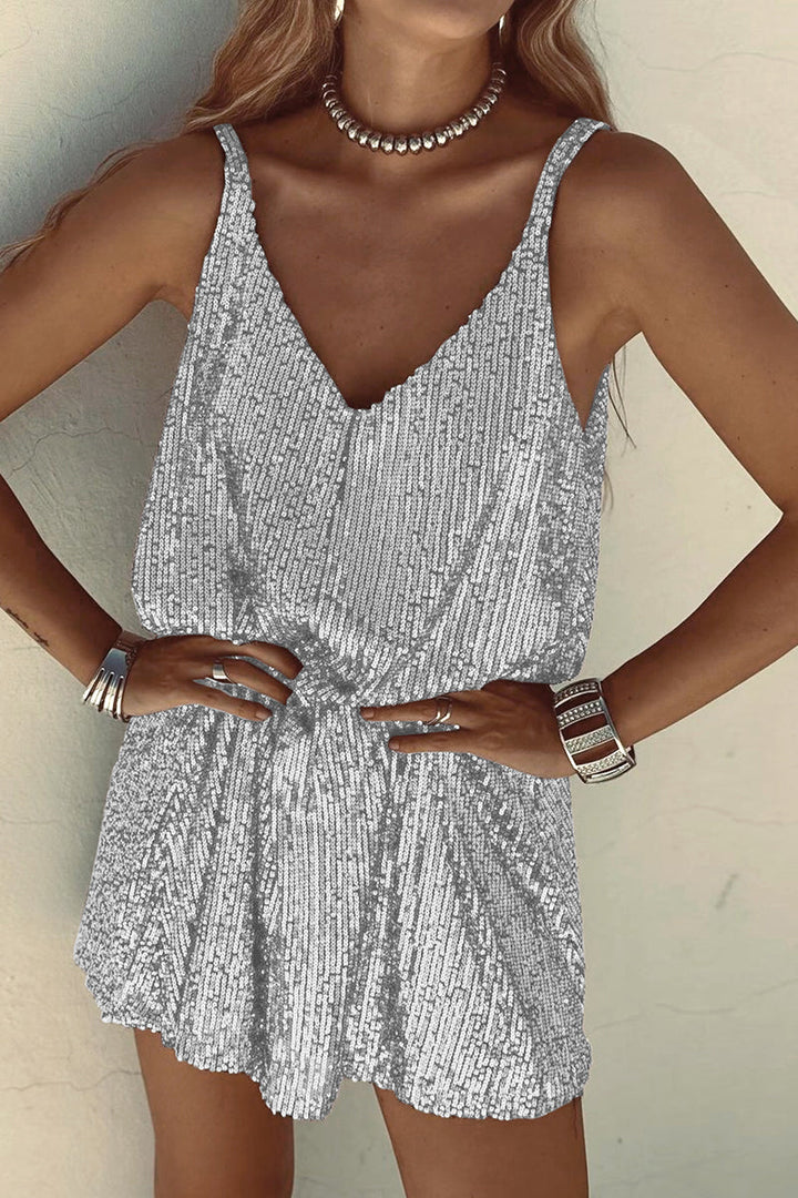 Women's sparkling sequin mini dress with V-neck. Glamorous party & evening wear, perfect for dazzling.