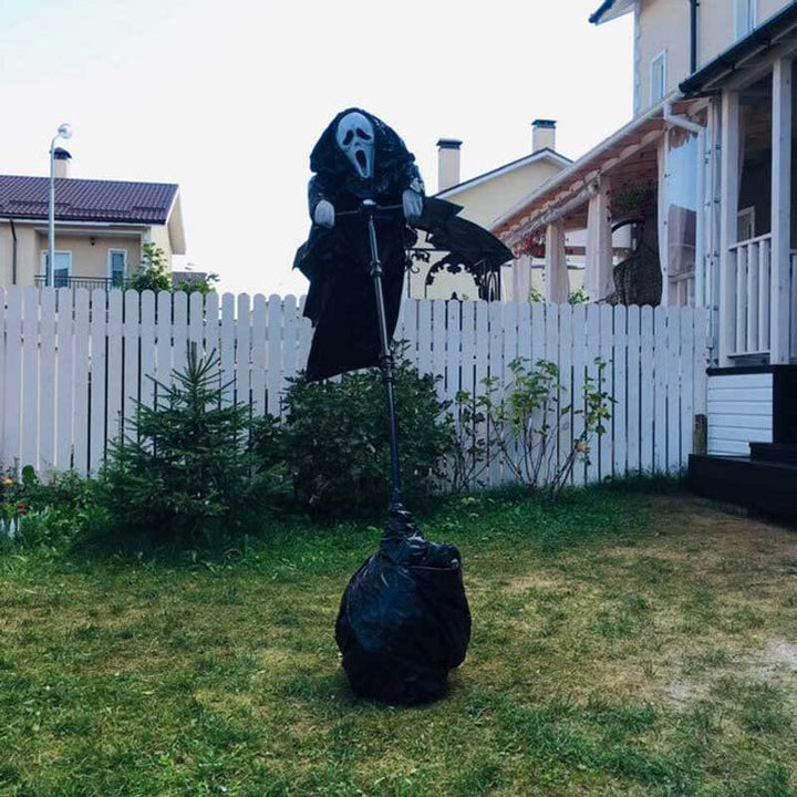 Unisex hanging ghost scarecrow, a horror-themed Halloween party prop for a spooky outdoor display