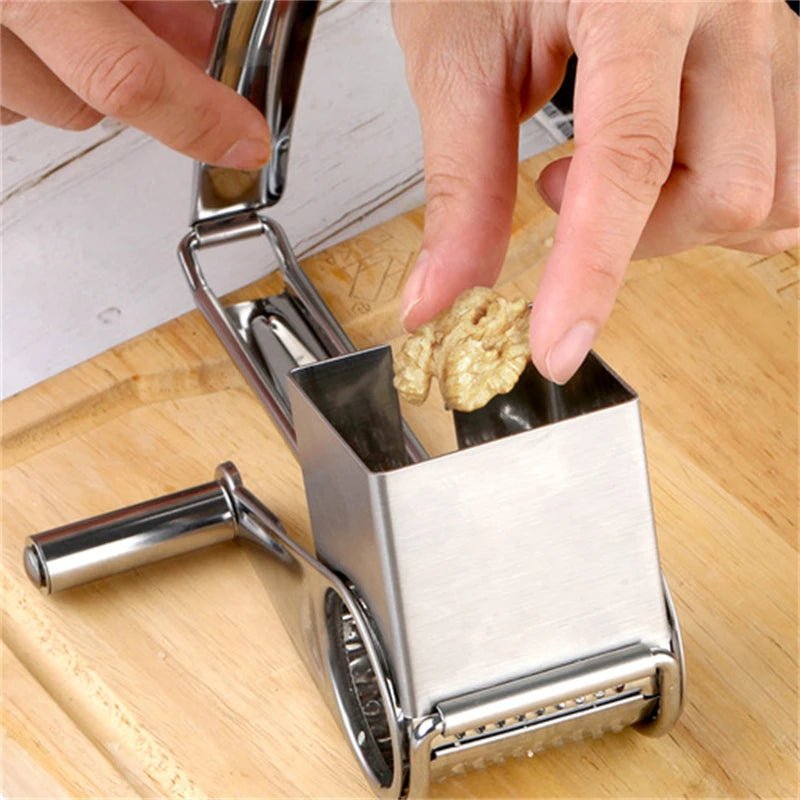 Durable stainless steel rotary grater, ideal for cheese, nuts, and various vegetables.