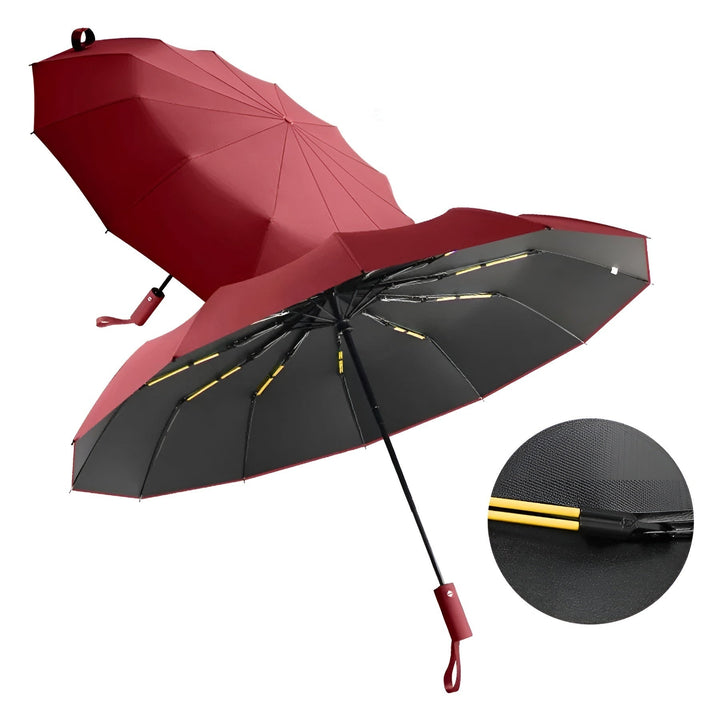 Ergonomic non-slip handle of the StormShield compact travel umbrella, comfortable grip.
