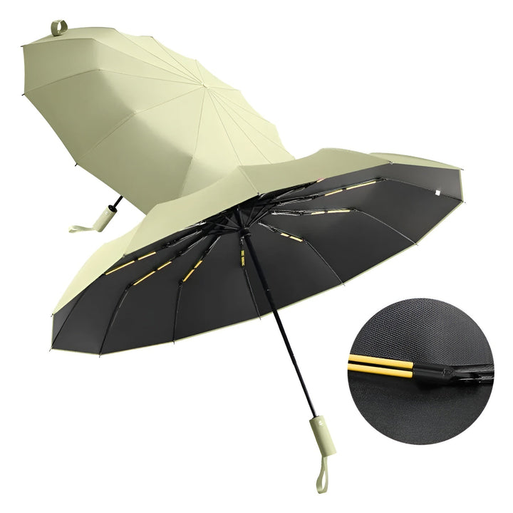 Folded StormShield compact travel umbrella, perfect for easy packing and portability.