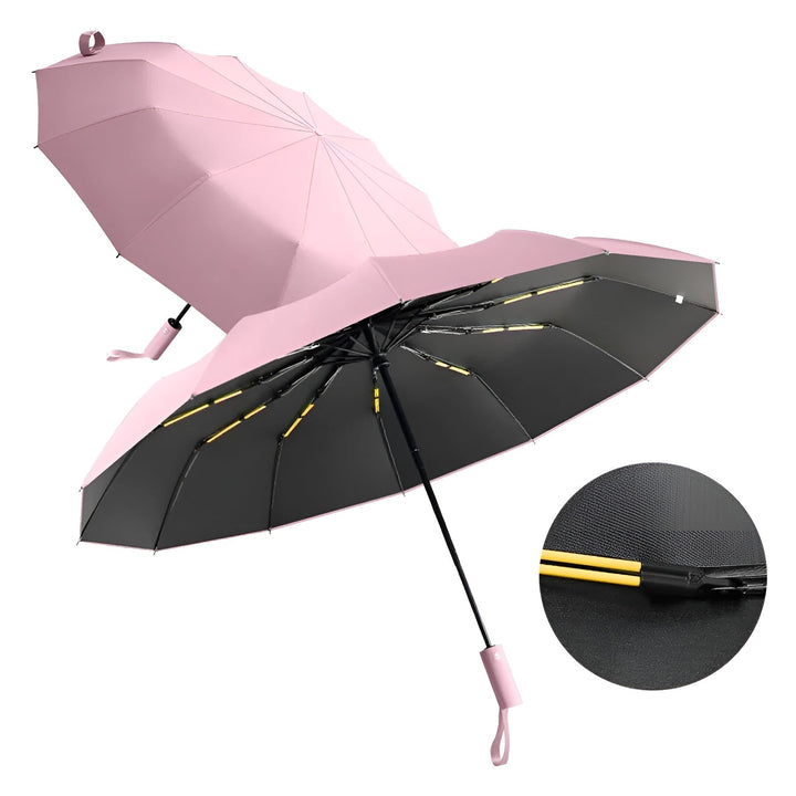 Closed StormShield folding umbrella, showcasing its sleek compact design for travel bags.