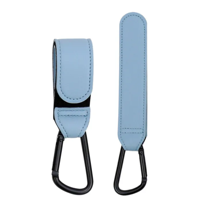 Multipurpose stroller hooks with vegan leather straps, ideal for busy parents on the go.