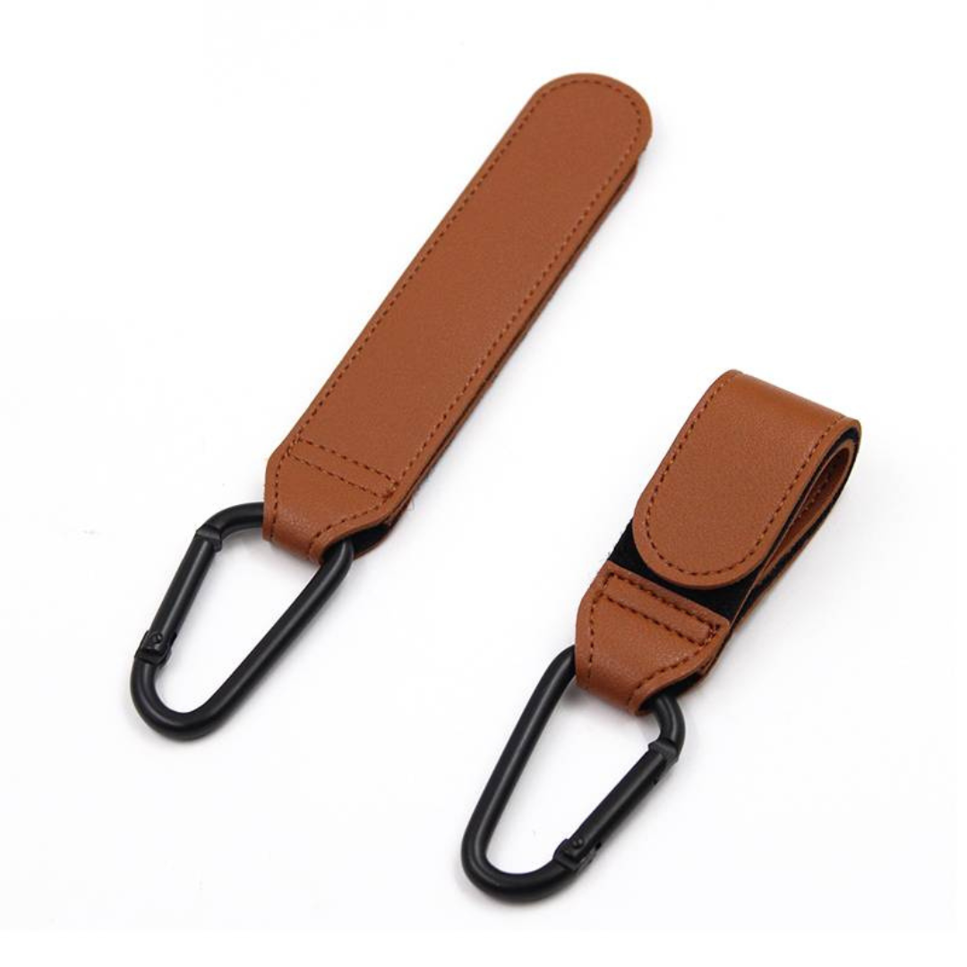 Stroller accessory organizer hooks, providing convenient storage for bags and purses.