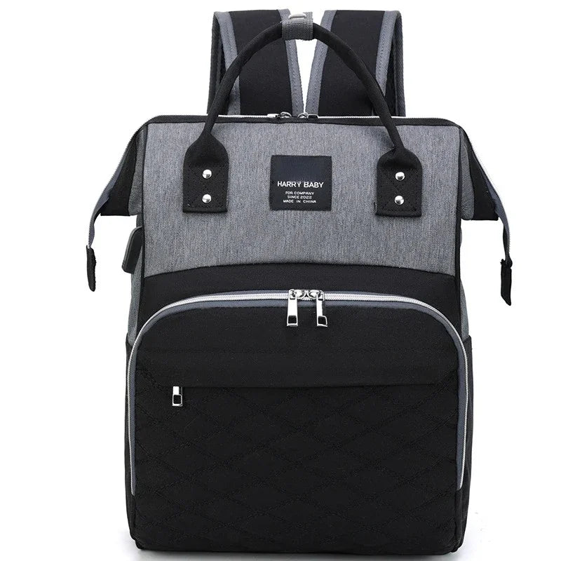 Modern mom's baby bag featuring a changing pad pocket, convenient parenting gear