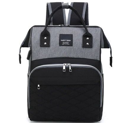 Modern mom's baby bag featuring a changing pad pocket, convenient parenting gear