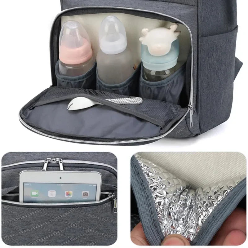 Mom carrying a cute pink diaper bag backpack, perfect for baby essentials
