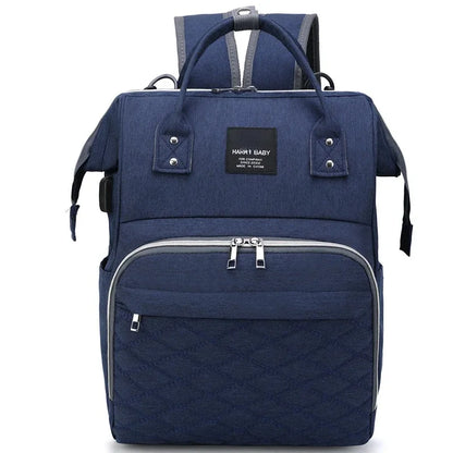 Maternity backpack with insulated bottle pockets, ideal for baby care on the go