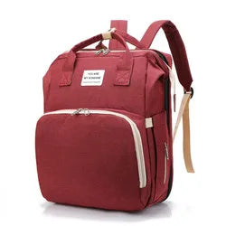 USB charging stylish diaper backpack, includes a portable changing pad, great for modern parents.