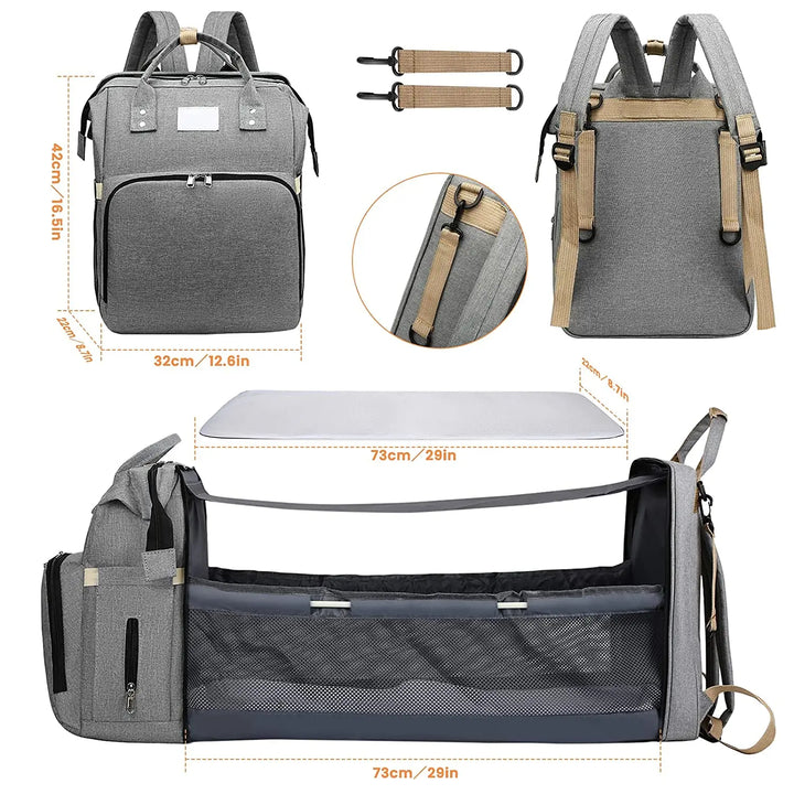 Dark blue women's diaper bag, featuring a portable changing pad, for stylish and practical moms.