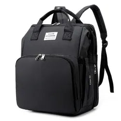 Fashionable women's diaper backpack, complete with portable changing pad & many pockets.