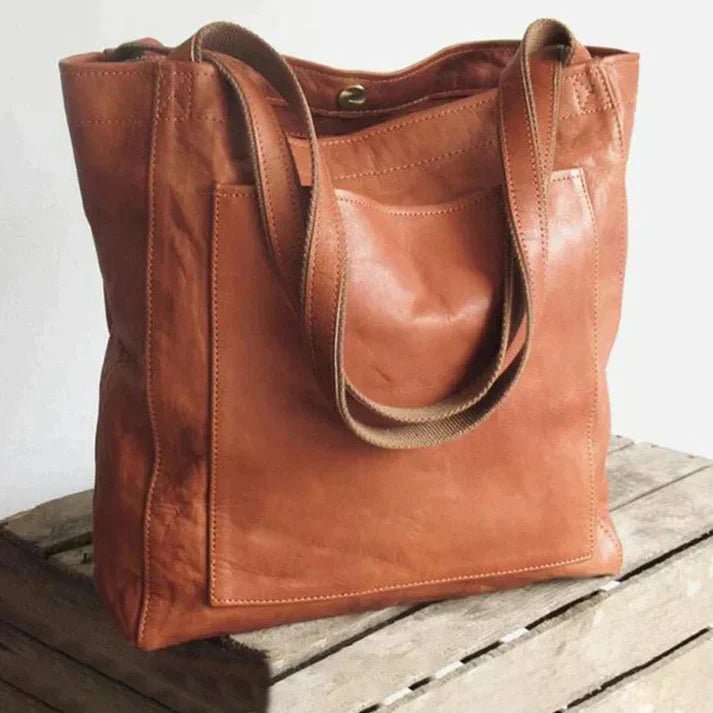Stylish brown women's versatile crossbody shoulder bag. Perfect everyday purse with organized compartments.